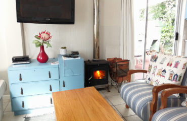 Garden Cottage Fire place and sitting area